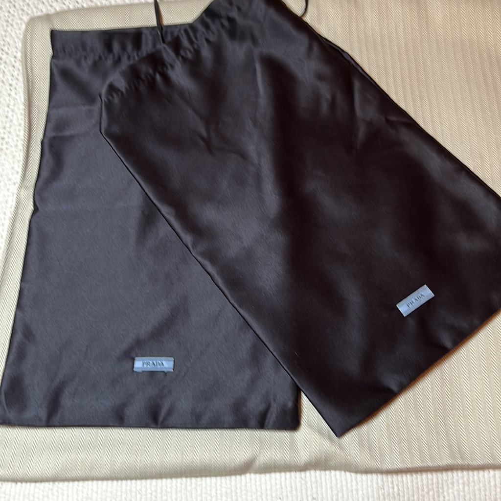 Two Prada Duffel Bags